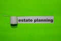 Estate Planning, Inspiration and business concept on green torn paper