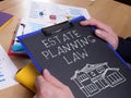 Estate planning law is shown using the text on the paper Royalty Free Stock Photo