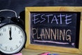 Estate Planning on phrase colorful handwritten on blackboard. Royalty Free Stock Photo