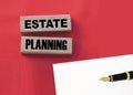 Estate planning words on wooden blocks on yellow. Real esate business concept