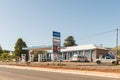 Street scene with gas station, shop and vehicles at Moorleigh