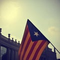 The estelada, the Catalan pro-independence flag, against the sky