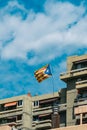 Estelada flag of catalonia with flagpole waving on the balcony of a building in barcelona