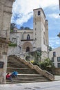 Pilgrims resting at Saint Peters Church staircase