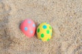 ester day beautiful pink, yellow egg on beach background Royalty Free Stock Photo