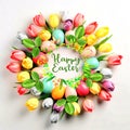 Ester eggs and flowers in circle shape on pastel colorful background greetings card concept Royalty Free Stock Photo