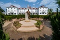 The Stanley Hotel, with statue and garden in view