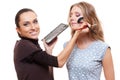 Esthetician applying eyeshadow Royalty Free Stock Photo