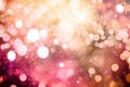 Festive lights bokeh background. Glitter vintage lights background with lights defocused Royalty Free Stock Photo