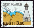 ESTONIA - CIRCA 1998: A stamp printed in Estonia shows Kunda Lighthouse and nautical chart, circa 1998. Royalty Free Stock Photo