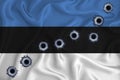 Estonia flag Close-up shot on waving background texture with bullet holes. The concept of design solutions. 3d rendering Royalty Free Stock Photo