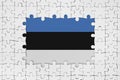 Estonia flag in frame of white puzzle pieces with missing central part Royalty Free Stock Photo