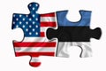 Estonia flag and United States of America flag on two puzzle pieces on white isolated background. The concept of political Royalty Free Stock Photo