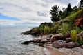 Boulders smooth stones lie near the water Royalty Free Stock Photo