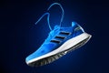 3.10.2022 Estonia, Tallinn: adidas runfalcon shoes. Adidas Running Shoes, orange blue color