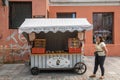 Female vendor sells almond sweets, Tallinn, Estonia Royalty Free Stock Photo