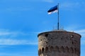 Estonian flag on Tall Hermann Tower in the Old Town of Tallinn, Estonia Royalty Free Stock Photo