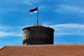 Estonian flag on Tall Hermann Tower in the Old Town of Tallinn, Estonia Royalty Free Stock Photo