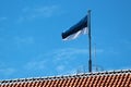 Estonian flag on Tall Hermann Tower in Old Town of Tallinn, Estonia Royalty Free Stock Photo