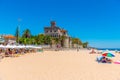 ESTORIL, PORTUGAL, MAY 31, 2019: Estoril castle viewed behind Tamariz beach in Portugal Royalty Free Stock Photo