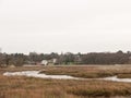 estuary river scene autumn winter white sky foliage landscape