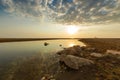 Estuary of a small river on a sandy beach, Greece. Royalty Free Stock Photo