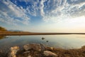 Estuary of a small river on a sandy beach, Greece. Royalty Free Stock Photo