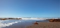 Estuary water emptying into Pacific Ocean at Moonstone Beach in Cambria on the Central California coastline in the United States