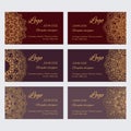 Et of luxury golden ornaments on brown background with sample text Royalty Free Stock Photo