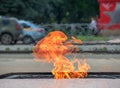 Fire flame symbol memory event monument monument town city street background traffic motor transport flames heat temperature tempe Royalty Free Stock Photo