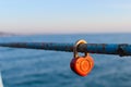 Eternal love symbol red heart. the tradition of hanging a lock on the railing. lovers locked the lock on the fence as a sign of lo