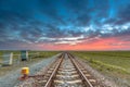 Eternal railroad perspective under fantastic sky