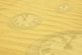 Eternity background - clock faces dissolving in sand Royalty Free Stock Photo