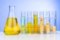 Ethanol biofuel derived from corn maze with beaker test tubes and corn cob in laboratory Royalty Free Stock Photo