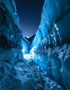 Ethereal Blue Light Inside a Glacier Cave at Night Royalty Free Stock Photo
