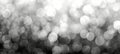 Ethereal grey light bokeh blur perfect for crafting captivating abstract backgrounds