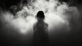 Ethereal Portraiture: Woman\'s Silhouette Emerging From Thick White Fogger