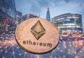 ethereum against skyscrapers - futuristic smart city - cryptocurrency concept