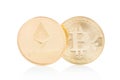 Ethereum and Bitcoin, golden coins on white, clipping path