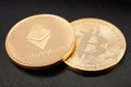 Ethereum and Bitcoin, golden coins on black background