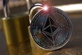 A ethereum coin and a lock