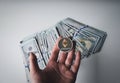 Ethereum on pile of US dollar bills