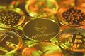 Ethereum silver coin against the background of other golden coins. Royalty Free Stock Photo