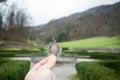 Ethereum silver coin, Hand hold ethereum in the park and natural background