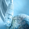 Ethernet cable and globe Royalty Free Stock Photo