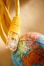 Ethernet cable and globe Royalty Free Stock Photo