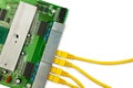 Ethernet switch board with yellow patch cords top view. Royalty Free Stock Photo