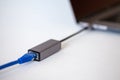 ethernet - type c adapter for laptop on white background. Royalty Free Stock Photo