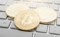 Etherum, Bitcoin, Ripple on the keyboard Royalty Free Stock Photo