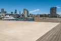 Ethiad stadium and highrise buildings from waterfront lookout Docklands, Melbourne, Australia